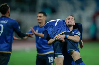 Kosovo's Bernard Berisha lifts his teammate Milot Rashica as they celebrate the opening goal during the Euro 2024 group I qualifying soccer match between Kosovo and Israel at the Fadil Vokrri stadium in Pristina, Kosovo, Sunday, Nov. 12, 2023. (AP Photo/Visar Kryeziu)

- XEURO2024X
