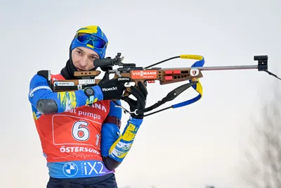 Artem Tyshchenko of Ukraine in action during the warm up before the Single Mixed Relay event of the IBU World Cup Biathlon in Ostersund, Sweden, Saturday, Nov. 25, 2023. (Anders Wiklund/TT News Agency via AP)