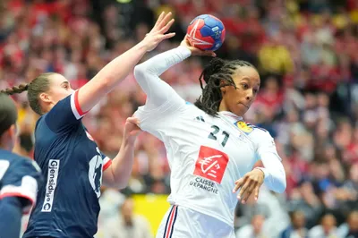 France's Orlane Kanor, right, controls the ball, during the Women's Handball Championship  Handball final match between Norway and France,  at Jyske Bank Boxen, in Herning, Denmark, Sunday, Dec. 17, 2023. (Claus Fisker/ Ritzau Scanpix via AP)