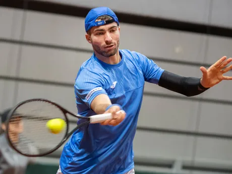 Slovenský tenista Lukáš Pokorný  počas zápasu dvojhry Davisovho pohára Srbsko - Slovensko