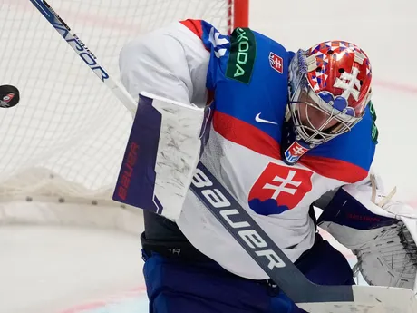 Slovakia's goalkeeper Samuel Hlavaj makes a save during the preliminary round match between France and Slovakia at the Ice Hockey World Championships in Ostrava, Czech Republic, Saturday, May 18, 2024. (AP Photo/Darko Vojinovic)