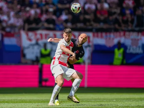 Bruno Petkovič a Arlind Ajeti počas zápasu Chorvátsko - Albánsko na EURO 2024. 