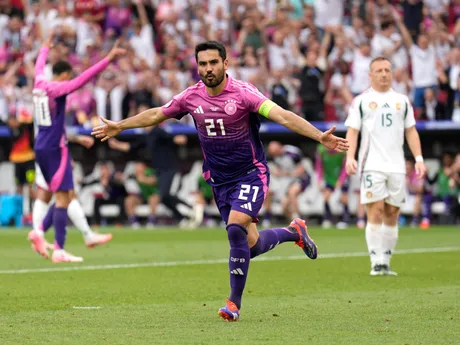 Germany's Ilkay Gundogan celebrates after scoring his side's second goal during a Group A match between Germany and Hungary at the Euro 2024 soccer tournament in Stuttgart, Germany, Wednesday, June 19, 2024. (AP Photo/Ariel Schalit)

- XEURO2024X