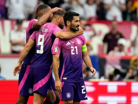 Germany's Ilkay Gundogan (21) celebrates with teammates after scoring his side's second goal during a Group A match between Germany and Hungary at the Euro 2024 soccer tournament in Stuttgart, Germany, Wednesday, June 19, 2024. (AP Photo/Matthias Schrader)

- XEURO2024X