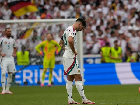 Hungary's Dominik Szoboszlai stands after Germany's Ilkay Gundogan scored his side's second goal during a Group A match between Germany and Hungary at the Euro 2024 soccer tournament in Stuttgart, Germany, Wednesday, June 19, 2024. (AP Photo/Antonio Calanni)

- XEURO2024X