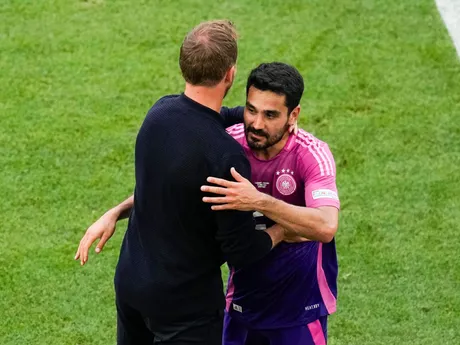 Germany's head coach Julian Nagelsmann, left, greets Ilkay Gundogan during a Group A match between Germany and Hungary at the Euro 2024 soccer tournament in Stuttgart, Germany, Wednesday, June 19, 2024. (AP Photo/Themba Hadebe)

- XEURO2024X