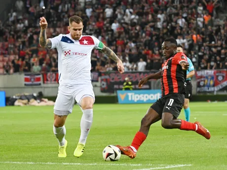 Na snímke hráč Trnavy Philip Azango (vpravo) a kapitán Wisly Alan Uryga počas prvého zápasu 3. predkola Európskej konferenčnej ligy medzi FC Spartak Trnava - Wisla Krakov.