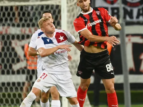 Na snímke vpravo hráč Trnavy Adrian Zeljkovič a hráč Wisly Patrik Gogól počas prvého zápasu 3. predkola Európskej konferenčnej ligy medzi FC Spartak Trnava - Wisla Krakov.