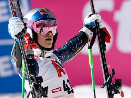 Brazil's Lucas Pinheiro Braathen celebrates at the finish area of an alpine ski, men's World Cup giant slalom, in Soelden, Austria, Sunday, Oct. 27, 2024. (AP Photo/Alessandro Trovati)