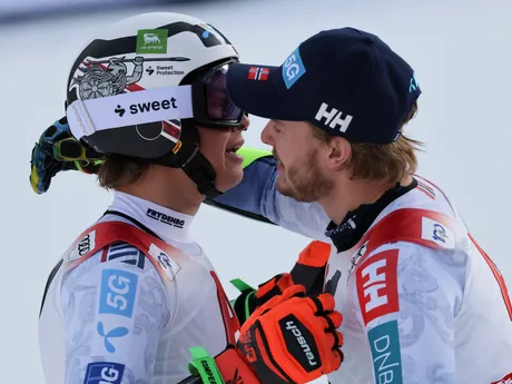 Norway's Alexander Steen Olsen, left, winner of an alpine ski, men's World Cup giant slalom, celebrates with third-placed Norway's Atle Lie McGrath, in Soelden, Austria, Sunday, Oct. 27, 2024. (AP Photo/Marco Trovati)