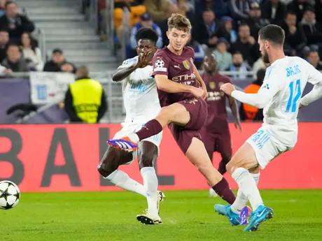 Manchester City's James McAtee scores his side's fourth goal during the Champions League opening phase soccer match between Slovan Bratislava and Manchester City in Bratislava, Slovakia, Tuesday, Oct. 1, 2024. (AP Photo/Petr David Josek)