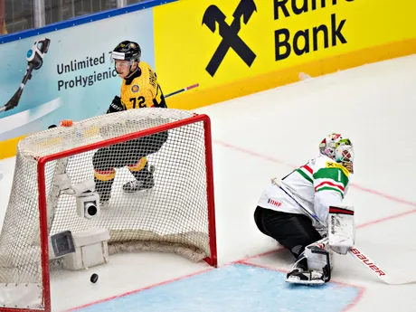 Germany's Dominik Kahum, top, scores during the group B IIHF Ice Hockey World Championships match between Germany and Hungary in Herning, Denmark, Saturday May 10, 2025. (Henning Bagger/Ritzau Scanpix via AP)