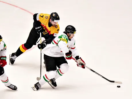 Germany's Maximillian Kastner and Hungary's Kristof Papp, right, in action during the group B IIHF Ice Hockey World Championships match between Germany and Hungary in Herning, Denmark, Saturday May 10, 2025. (Henning Bagger/Ritzau Scanpix via AP)