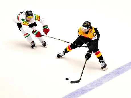 Germany's Wojciech Stachowiak, right, and Hungary's Andreas Mihalik in action during the group B IIHF Ice Hockey World Championships match between Germany and Hungary in Herning, Denmark, Saturday May 10, 2025. (Henning Bagger/Ritzau Scanpix via AP)