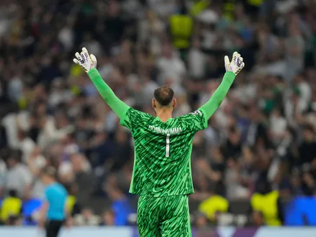 PSG's goalkeeper Gianluigi Donnarumma celebrates after Senny Mayulu scored his side's fifth goal during the Champions League final soccer match between Paris Saint-Germain and Inter Milan at the Allianz Arena in Munich, Germany, Saturday, May 31, 2025. (AP Photo/Matthias Schrader)

- XCHAMPIONSLEAGUEX