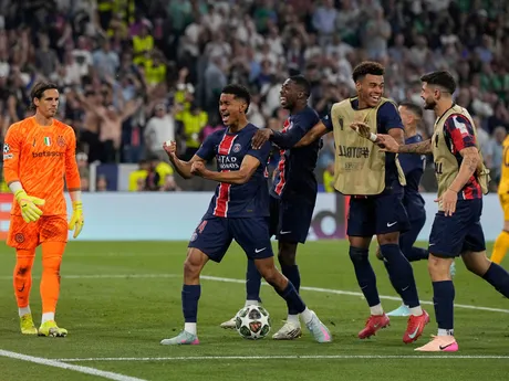 PSG's Senny Mayulu, left, celebrates after scoring his side's fifth goal during the Champions League final soccer match between Paris Saint-Germain and Inter Milan at the Allianz Arena in Munich, Germany, Saturday, May 31, 2025. (AP Photo/Martin Meissner)

- XCHAMPIONSLEAGUEX