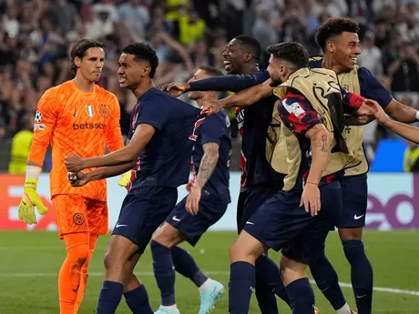 PSG's Senny Mayulu, left, celebrates after scoring his side's fifth goal during the Champions League final soccer match between Paris Saint-Germain and Inter Milan at the Allianz Arena in Munich, Germany, Saturday, May 31, 2025. (AP Photo/Martin Meissner)

- XCHAMPIONSLEAGUEX
