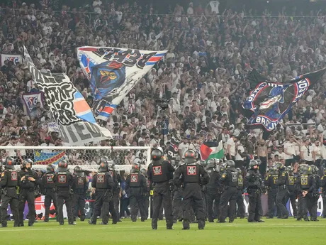 Police officials stand guard at the end of the Champions League final soccer match between Paris Saint-Germain and Inter Milan at the Allianz Arena in Munich, Germany, Saturday, May 31, 2025. (AP Photo/Martin Meissner)

- XCHAMPIONSLEAGUEX