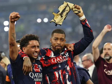 PSG's Marquinhos, left, and PSG's Presnel Kimpembe celebrate after the Champions League final soccer match between Paris Saint-Germain and Inter Milan at the Allianz Arena in Munich, Germany, Saturday, May 31, 2025. (AP Photo/Alexandra Beier)

- XCHAMPIONSLEAGUEX
