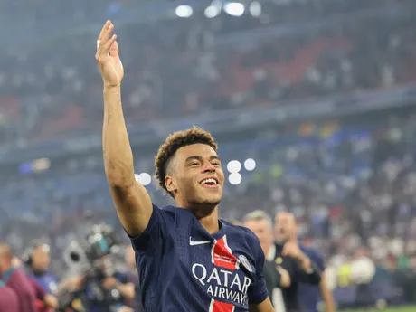 PSG's Desire Doue celebrates after the Champions League final soccer match between Paris Saint-Germain and Inter Milan at the Allianz Arena in Munich, Germany, Saturday, May 31, 2025. (AP Photo/Alexandra Beier)

- XCHAMPIONSLEAGUEX
