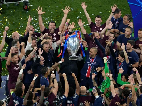 Players of PSG lift the trophy after winning the Champions League tournament at the Allianz Arena in Munich, Germany, Saturday, May 31, 2025. (AP Photo/Michael Probst)

- XCHAMPIONSLEAGUEX