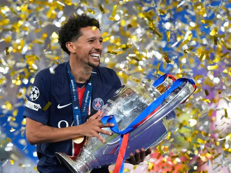PSG's team captain Marquinhos holds the trophy after winning the Champions League final soccer match between Paris Saint-Germain and Inter Milan at the Allianz Arena in Munich, Germany, Saturday, May 31, 2025. (AP Photo/Luca Bruno)

- XCHAMPIONSLEAGUEX