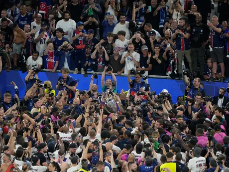 Players of PSG lift the trophy after winning the Champions League tournament at the Allianz Arena in Munich, Germany, Saturday, May 31, 2025. (AP Photo/Michael Probst)

- XCHAMPIONSLEAGUEX