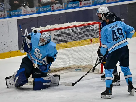 Patrik Andrisík a vpravo Samuel Takáč (obaja HC Slovan Bratislava) počas zápasu 13. kola hokejovej Tipsport ligy HC Slovan Bratislava - HK Spišská Nová Ves.