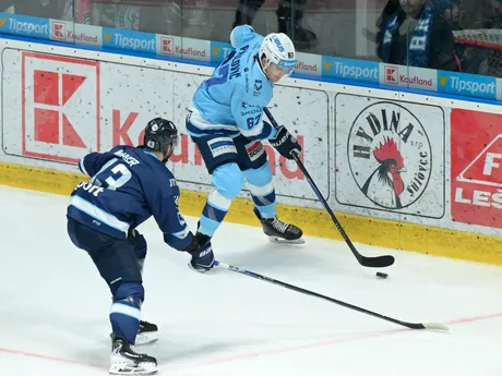 Zľava Patrik Maier (Slovan) a Matej Paulovič (Nitra) bojujú o puk