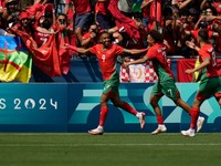 Futbalisti Maroka oslavujú gól.