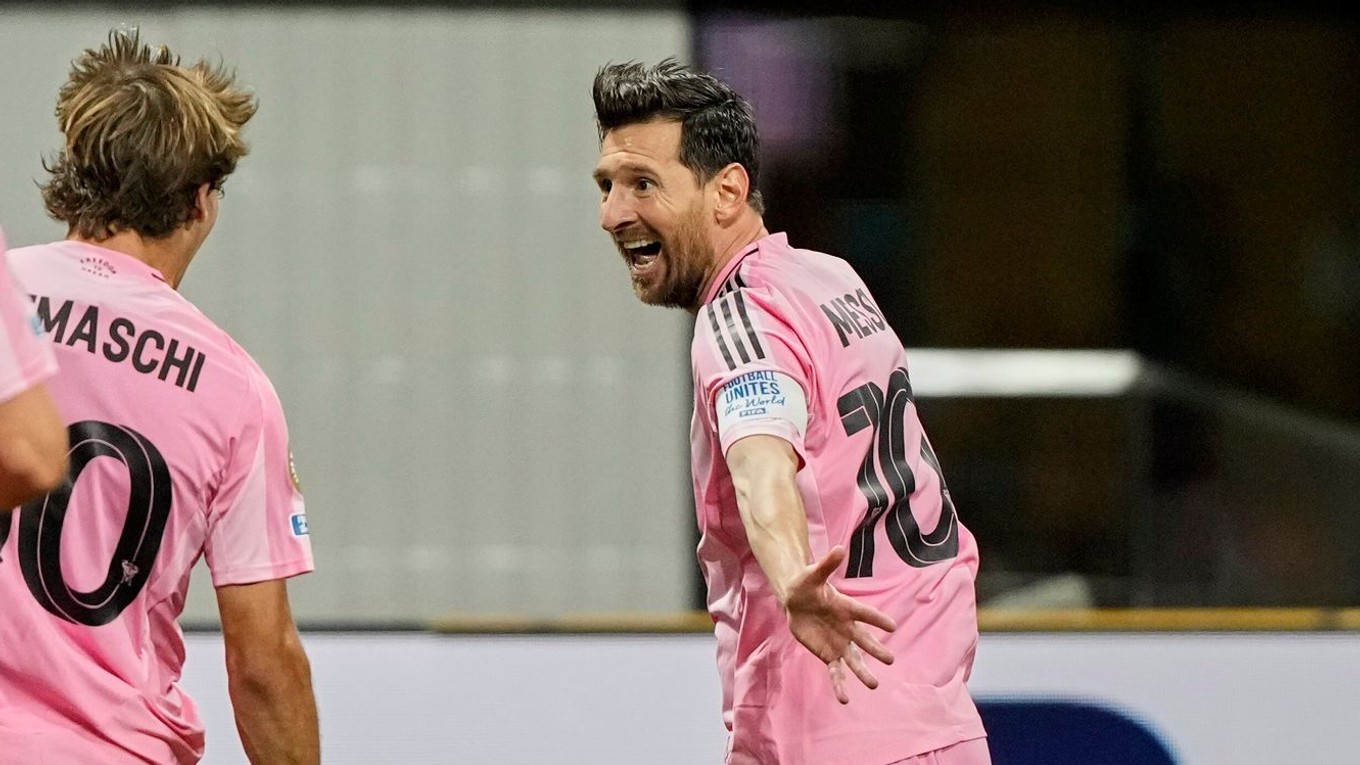 Inter Miami's Lionel Messi, right, celebrates after scoring his side's second goal during the Club World Cup group A soccer match between Inter Miami and FC Porto in Atlanta, Thursday, June 19, 2025. (AP Photo/Brynn Anderson)