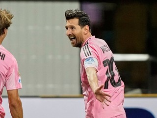 Inter Miami's Lionel Messi, right, celebrates after scoring his side's second goal during the Club World Cup group A soccer match between Inter Miami and FC Porto in Atlanta, Thursday, June 19, 2025. (AP Photo/Brynn Anderson)