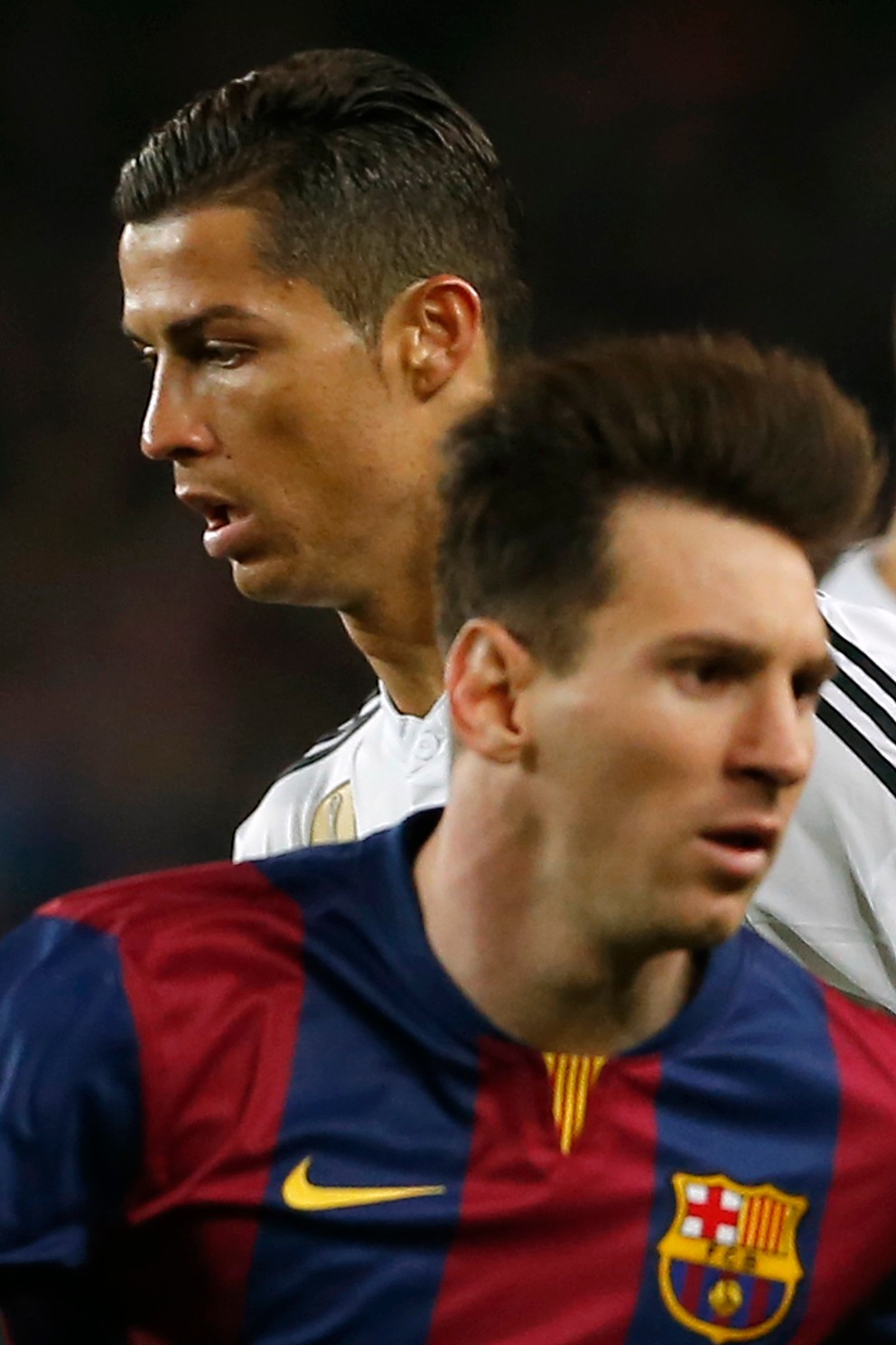 Sú najlepšími hráčmi súčasnosti. Cristiano Ronaldo (Real Madrid - v bielom) a Lionel Messi (FC Barcelona).