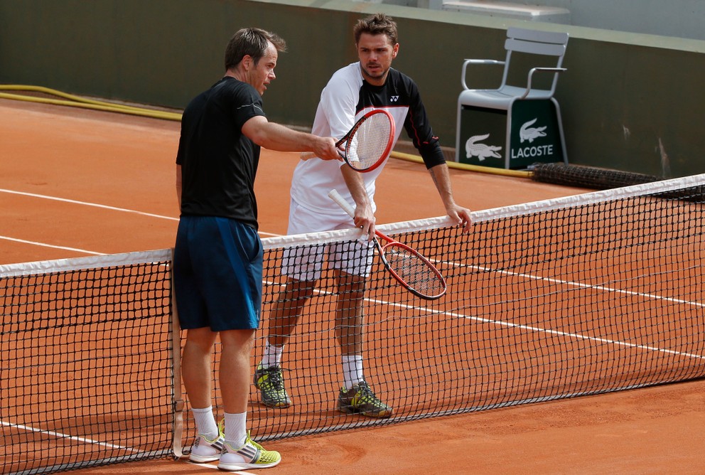 Magnus Norman (vľavo) komunikuje so Stanom Wawrinkom počas tréningu.