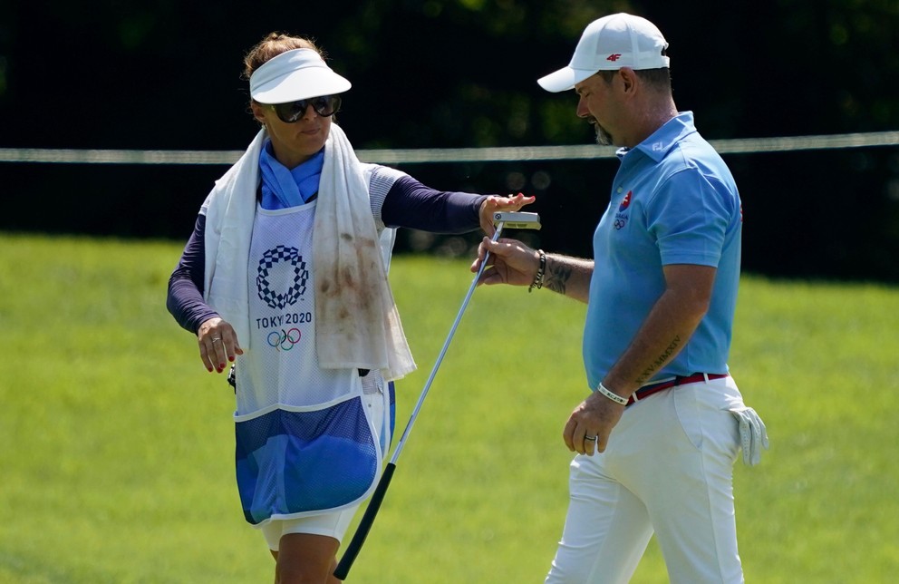 Golfista Rory Sabbatini s caddym - manželkou Martinou.