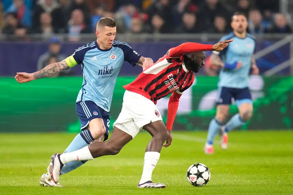 From the left Juraj Kuck and Youssouf Fofana in the match of the Slovan Bratislava Champions League - AC Milan.