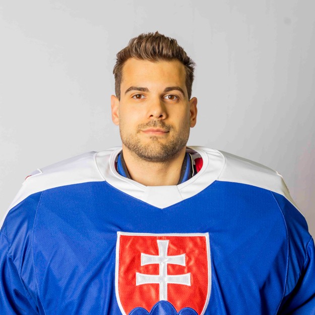 Adam Húska. 