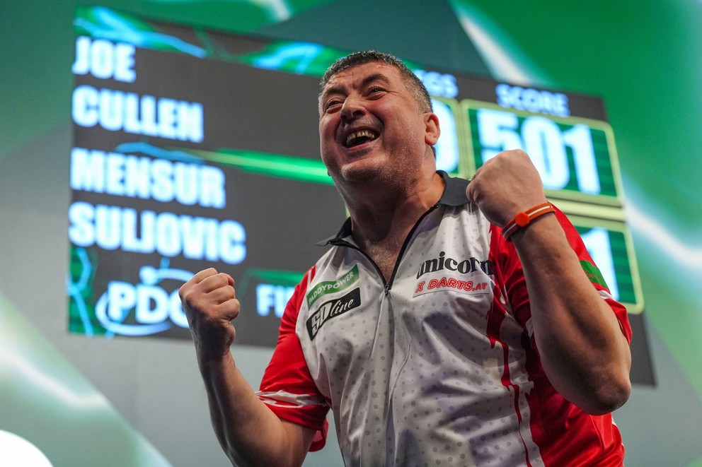 Austrian darts player Mensur Suljović is happy about his victory over Joe Cullen at the 2026 WC.