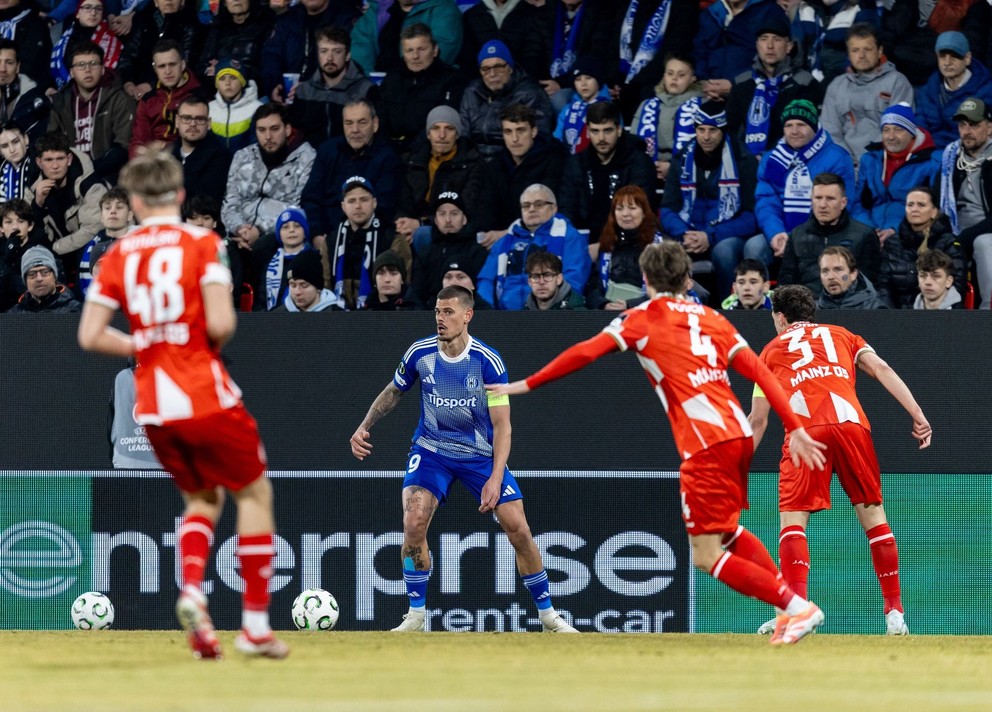 Momentka zo zápasu Olomouc - Mainz.