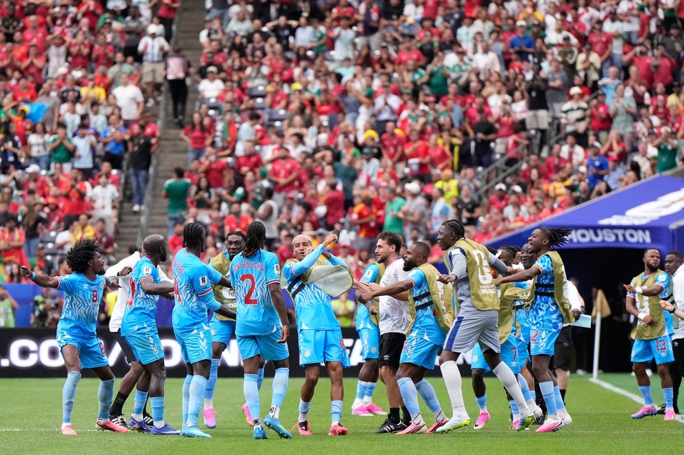 Congolese players celebrate after Yoane Wissa's opening goal during the Group K match between Portugal and DR Congo at the 2026 World Cup.