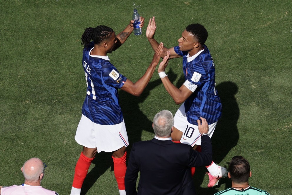 Michael Olise a  Kylian Mbappe.